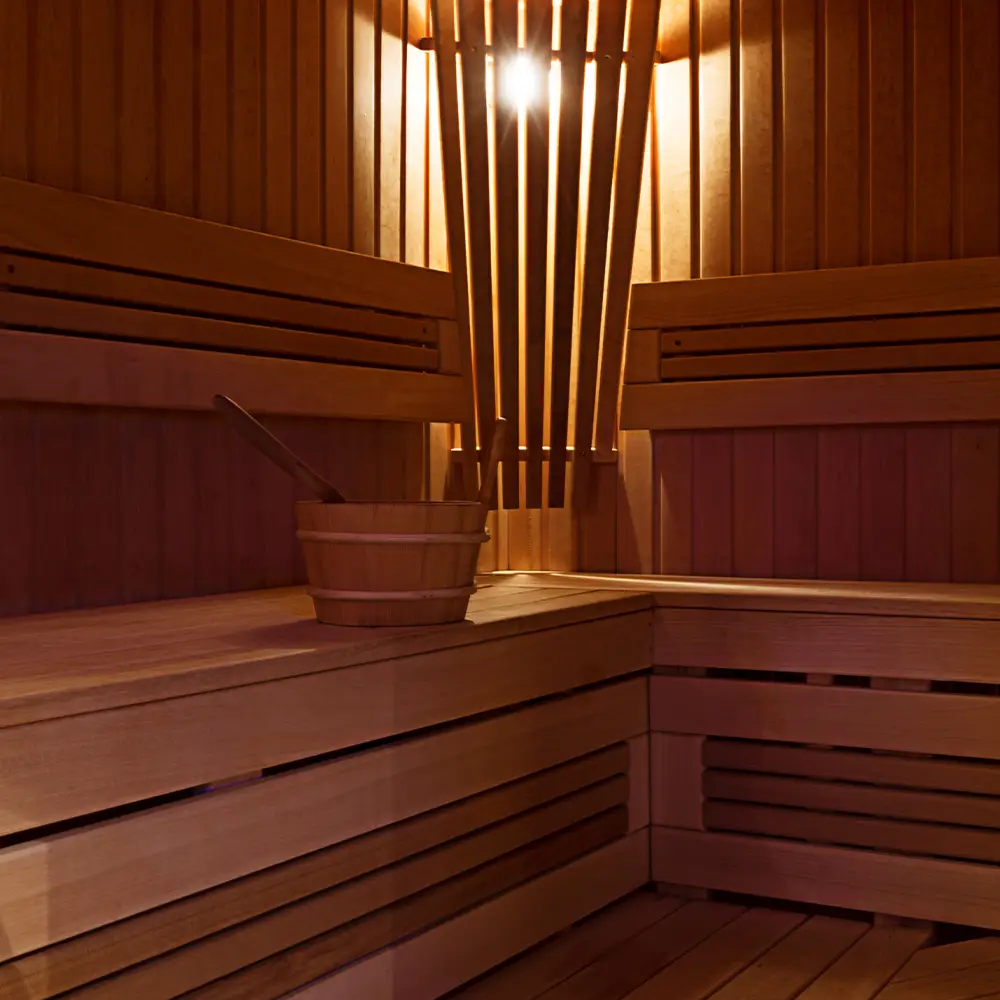Photograph inside of a sauna with gentle lighting